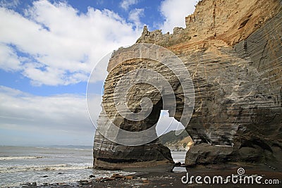 New Zealand North island Tongaporutu the black sandy Three Sisters Beach Area 15 km south from Mokau,New Zealand Stock Photo