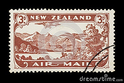 1931 New Zealand airmail stamp with plane and landscape Editorial Stock Photo