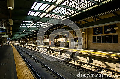 View of passengers waiting on the platform for their trains at Newark Penn Station Editorial Stock Photo