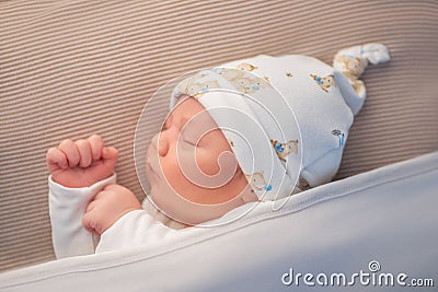 Newborn adorable one week baby boy sleeping Stock Photo