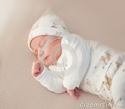 Newborn adorable one week baby boy sleeping Stock Photo