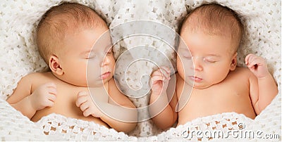 Newborn Babies Twins Sleep in Bed, Sleeping New Born Twin Kids Stock Photo