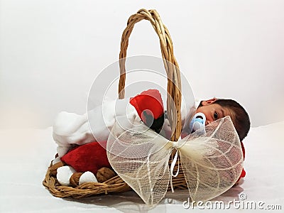 Newborn baby boy in basket Stock Photo