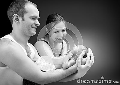 Newborn baby boy on the father's and mother's hand Stock Photo