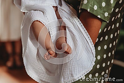 Newborn baby during christening Stock Photo