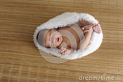 Newborn baby in a cocoon Stock Photo