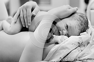 Newborn baby right after delivery Stock Photo