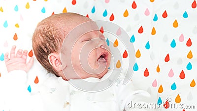 Newborn baby screaming in pain Stock Photo