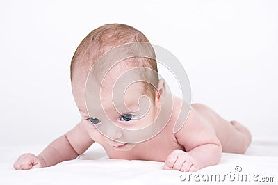 Newborn baby trying to heave its head Stock Photo