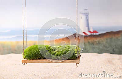 Newborn backdrop prop of a swing with moss. Stock Photo