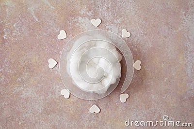 Newborn beautiful photography background - white bowl with white hearts on pink, blue and teal background Stock Photo