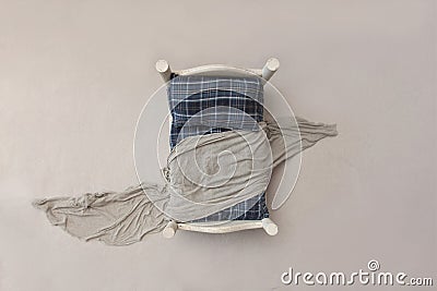 Newborn digital background - small white wooden bed with blue plaid mattress and pillow Stock Photo