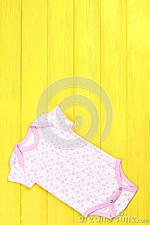 Newborn girl soft patterned romper. Stock Photo