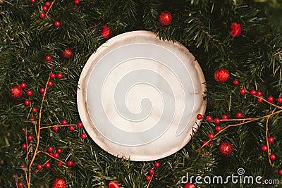 Newborn photography background - white bowl on pine tree background, with snow, pinecones and ornaments. Christmas newborn Stock Photo