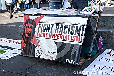 Information table with Fight Racism Banner at the Free Palestine Rally Editorial Stock Photo