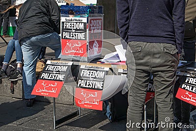 Information table with pro Palestine posters at the Free Palestine Rally Editorial Stock Photo