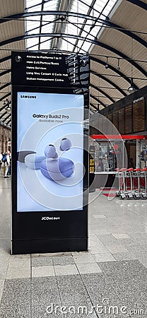 Advert for Samsung Galaxy Buds2 Pro headphones on illuminated billboard Editorial Stock Photo