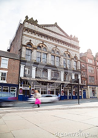 Newcastle Tyne Theatre building exterior with traffic moving past Editorial Stock Photo