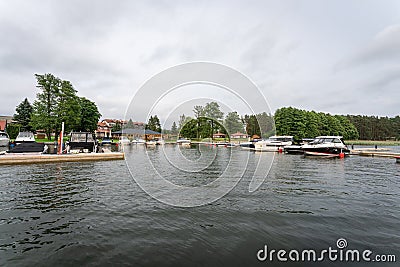 Newly built docks in Piaski, Mazury Lake District, Poland Editorial Stock Photo