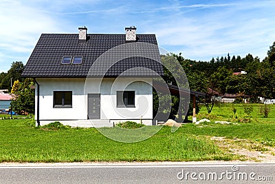 A newly built family home with garden Stock Photo