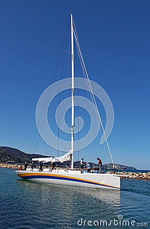 Newly built racing yacht Oystercatcher prepares to leave it`s Wellington harbour en route to Tauranga for shipping to the United Editorial Stock Photo