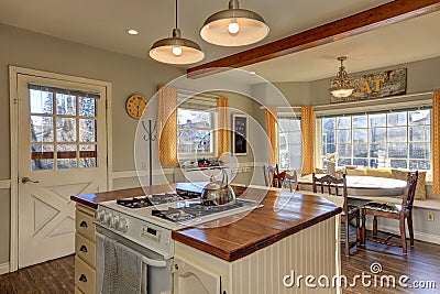 Newly renovated Kitchen and breakfast nook with wood beams on c Stock Photo