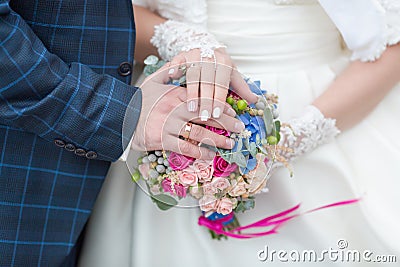 Newly wedded showing own hands with wedding rings Stock Photo