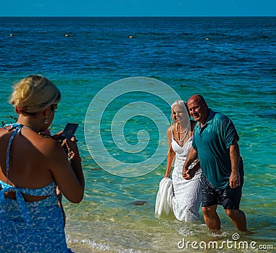 Newly Weds at the beach at Finest Playa Mujeres Resort in Cancun, Mexico Editorial Stock Photo