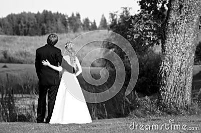Newlywed couple in countryside Stock Photo