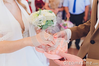 Newlyweds append signatures in a registry office during wedding registration. Stock Photo