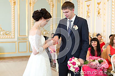 The newlyweds exchanged rings Stock Photo