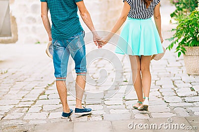 The newlyweds hold hands. Couple holding hands. Wedding in Monte Stock Photo