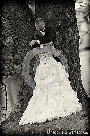 Newlyweds in park Stock Photo