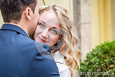 Newlyweds strolling around the city Stock Photo