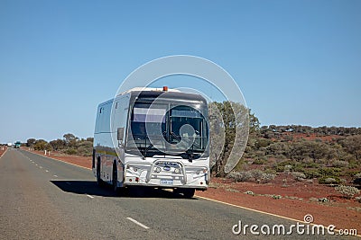 BCi Classmaster 57 bus on an outback road of Western Australia Editorial Stock Photo