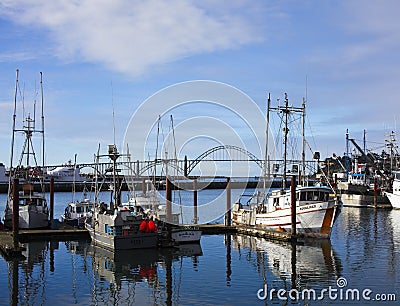 Newport bay bridge and docked fishing boats. Editorial Stock Photo