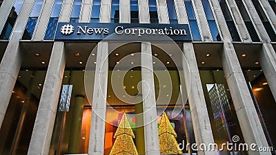 News Corporation sign on building with christmas tree decoration Editorial Stock Photo