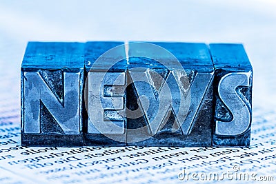 News in lead letters Stock Photo