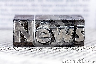 News in lead letters Stock Photo
