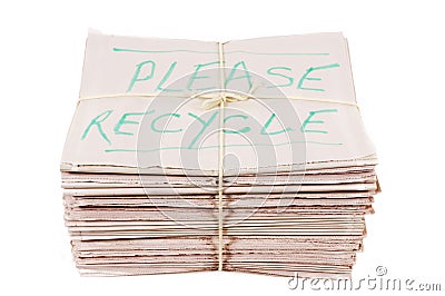 Tied bundle of newspapers with recycle notice, isolated on white background Stock Photo