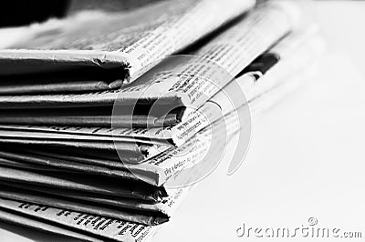 Newspapers folded Monochrome Stock Photo