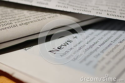 Newspapers with word News Stock Photo
