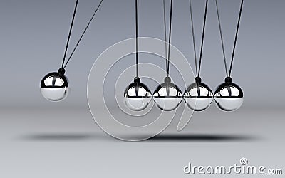 Newtons Cradle in motion Stock Photo