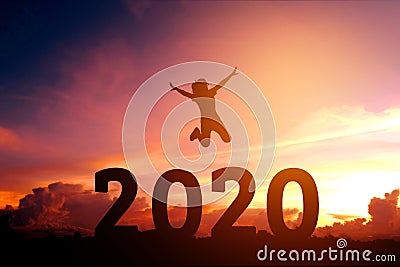 2020 Newyear Silhouette young woman jumping to Happy new year concept Stock Photo