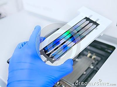 next generation sequencing flow cell. genetic engineering, genetic modification, designer baby and cloning concept Stock Photo