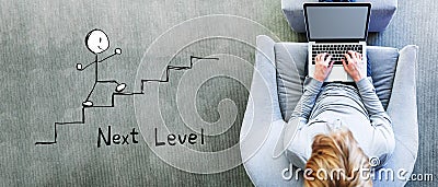 Next level concept with man using a laptop Stock Photo