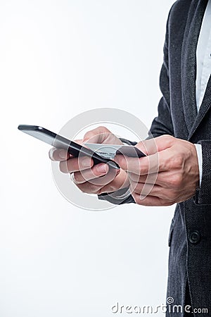 Nfc mobile payment man hold credit card phone Stock Photo