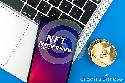 NFT cryptoart marketplace concept. Mobile phone for working with non-fungible token. Future of crypto currency Editorial Stock Photo