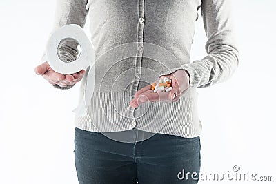 stomach problems. girl with toilet paper Stock Photo
