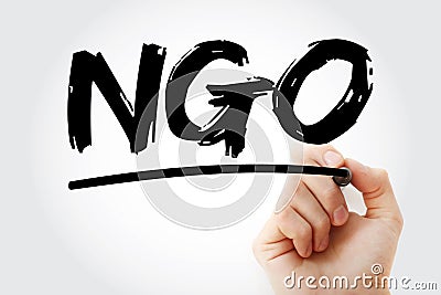 NGO - Non-Governmental Organization acronym with marker, business concept background Stock Photo